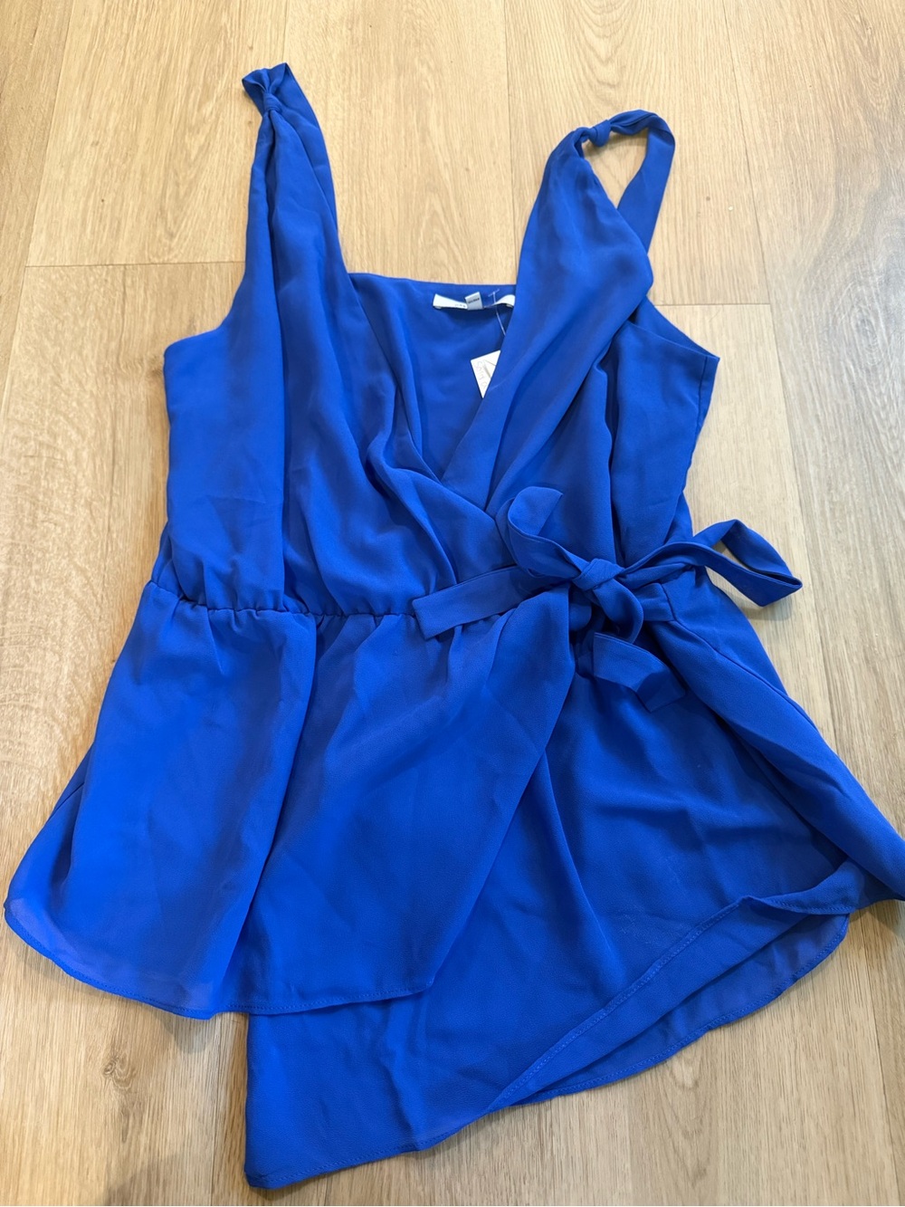 Blue Sleeveless Wrap Peplum Top with Tie size medium